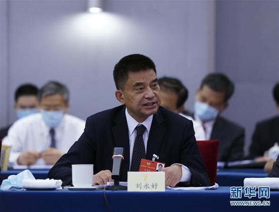  5月23日，全國政協(xié)委員劉永好在政協(xié)聯(lián)組會上發(fā)言。新華社記者 謝環(huán)馳 攝