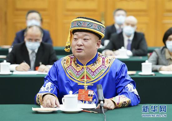  5月24日，全國人大代表宋慶禮參加湖北代表團的審議并發(fā)言。新華社記者 黃敬文 攝